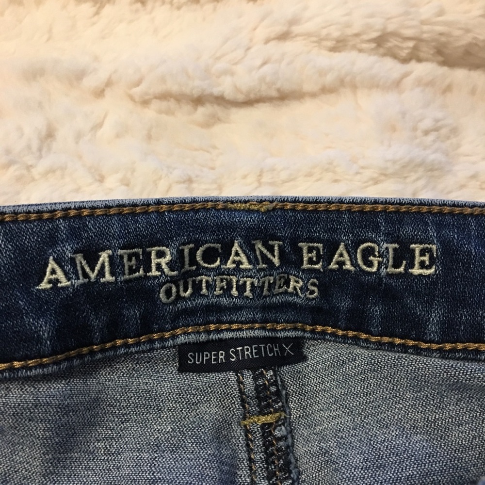 Medium Wash Ripped Jeans - Picture 2 of 4